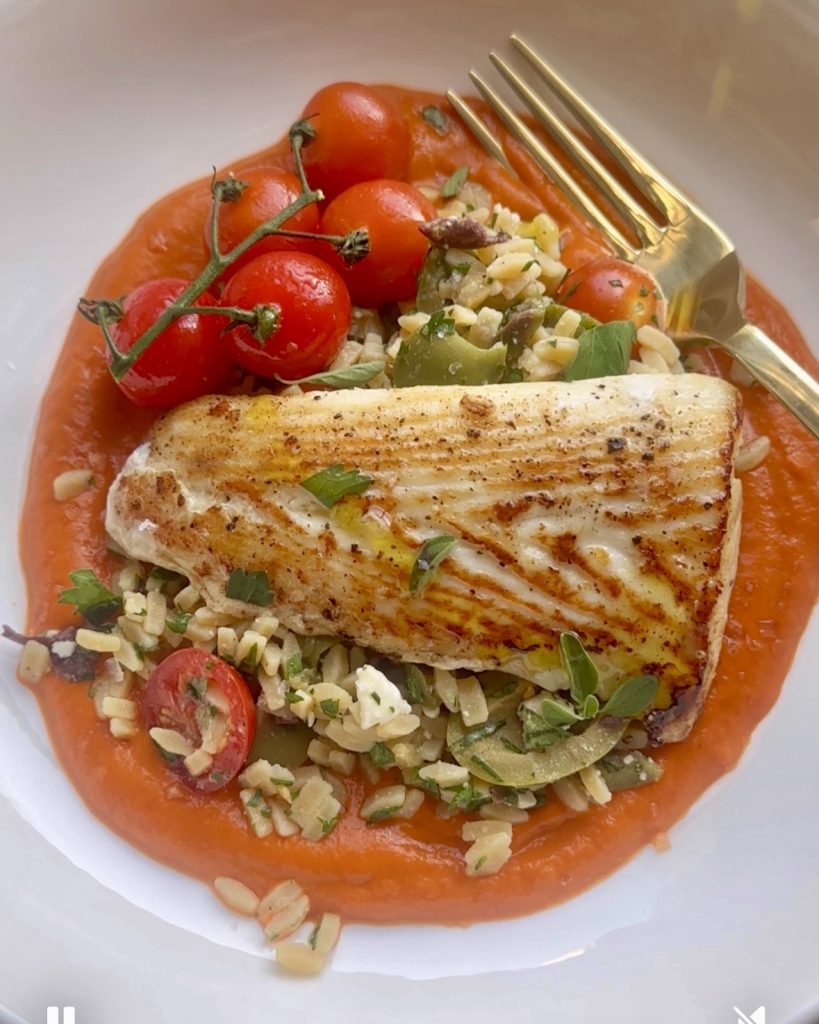 Photo of Simple Mediterranean Halibut with Roasted Red Pepper Coulis and Orzo Salad plated 
