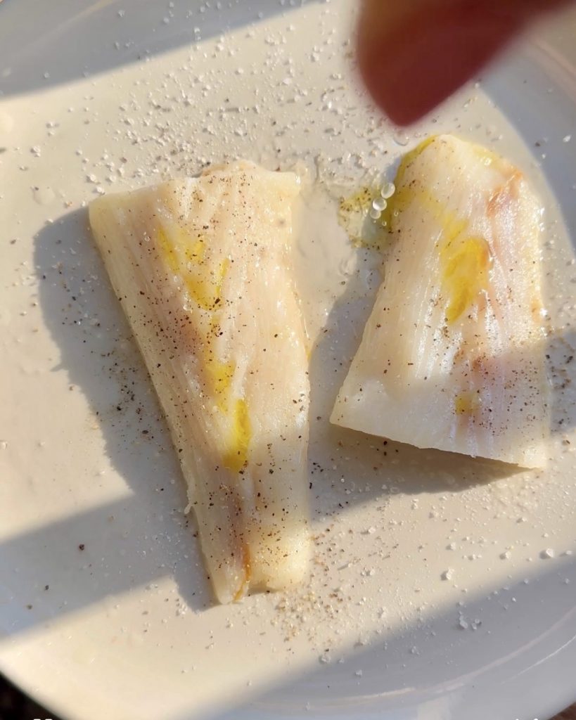 Halibut filets being marinated 